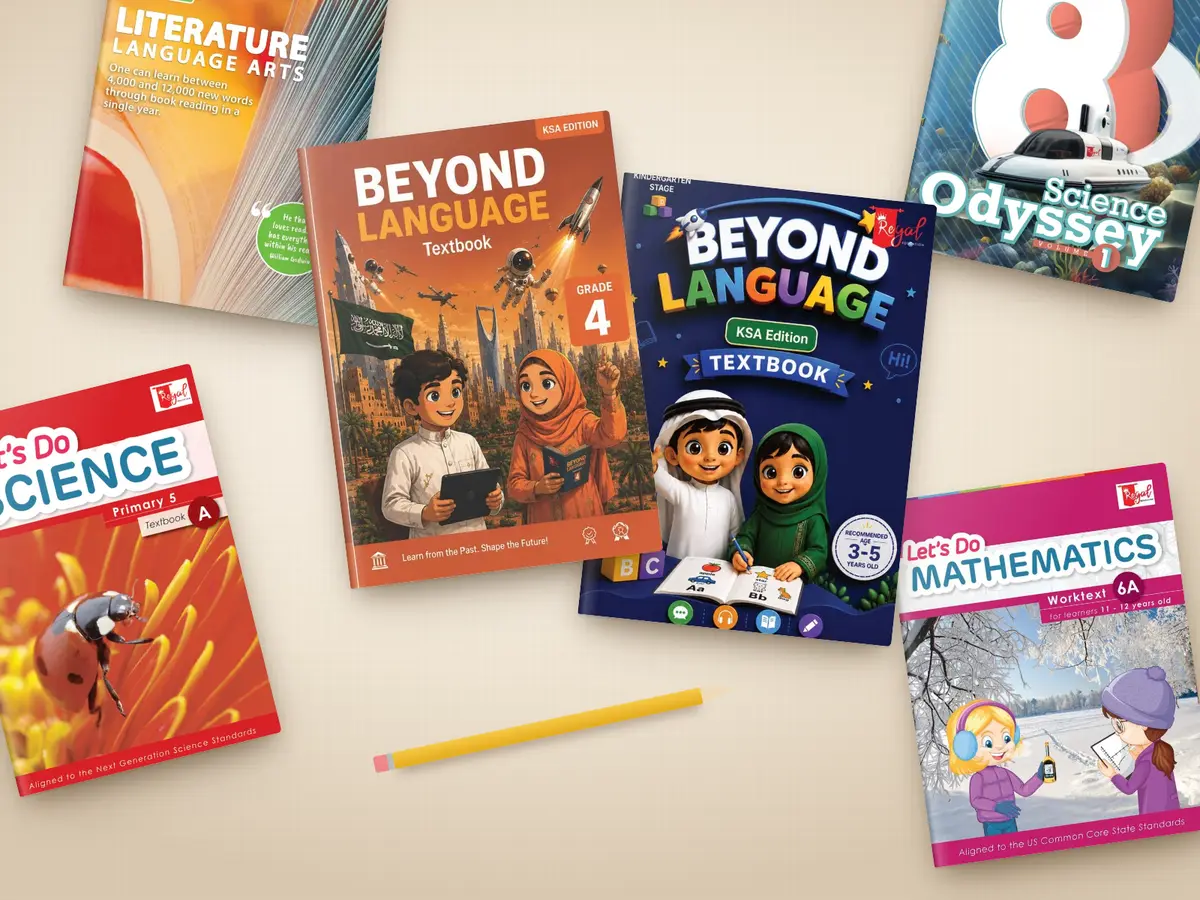 Regal Education KSA edition books on a table